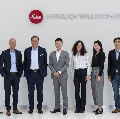 Gruppenbild: Manager von Leica und Xiaomi